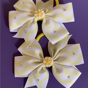 Yellow and white striped pony tail bow